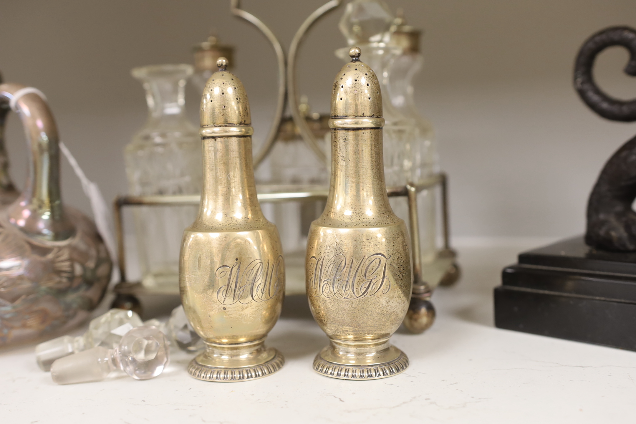 A pair of Tiffany silver peppers, a plated cruet and an overlaid whisky decanter, Tiffany peppers 14.5cm high